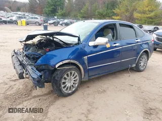 2009 Ford Focus SE z VIN 1FAHP35N59W232162, wystawiony jako IAAI lot #40884449 z przebiegiem Nie podano mil oraz . Historia ofert i sprzedaży dostępna na DreamBid. Obrazek 16.