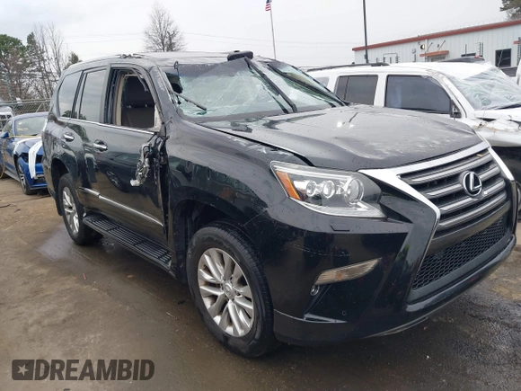 2014 Lexus GX 460 with VIN JTJBM7FX6E5073973, listed as a IAAI auction lot 41610332 with 128,870 mi miles. Bid and sale history available at carsss.com. Image 16.