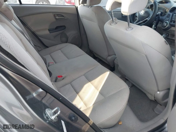 2010 Honda Insight LX with VIN JHMZE2H52AS014667, listed as a IAAI auction lot 41258620 with 138,419 mi miles. Bid and sale history available at carsss.com. Image 8.