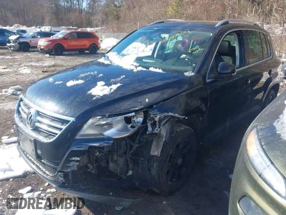 2011 Volkswagen Tiguan SE with VIN WVGBV7AXXBW511550, listed as a IAAI auction lot 41630804 with 99,967 mi miles and . Bid and sale history available at DreamBid. Image 17.