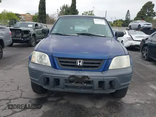 1999 Honda CR-V LX with VIN JHLRD1745XC014868, listed as a IAAI auction lot 41775272 with 212,835 mi miles. Bid and sale history available at carsss.com. Image 12.