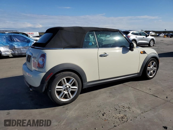 2014 MINI Convertible z VIN WMWZN3C5XET569992, wystawiony jako Copart lot #81044304 z przebiegiem 132 967 mil mil oraz Czysty tytuł • Clean title. Historia ofert i sprzedaży dostępna na DreamBid. Obrazek 3.