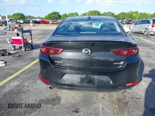 2021 Mazda 3 Premium with VIN JM1BPADL7M1303484, listed as a IAAI auction lot 41666785 with 34,476 mi miles and . Bid and sale history available at DreamBid. Image 16.