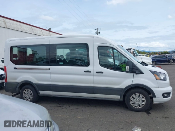 2023 Ford Transit Passenger XL with VIN 1FBAX2C80PKA94008, listed as a IAAI auction lot 42007461 with 35,553 mi miles and . Bid and sale history available at DreamBid. Image 13.