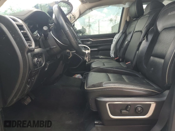 2021 Ram 1500 Laramie z VIN 1C6SRFJTXMN719184, wystawiony jako Copart lot #57024995 z przebiegiem 70 194 mil mil oraz Nie do naprawy • Non repairable. Historia ofert i sprzedaży dostępna na DreamBid. Obrazek 7.