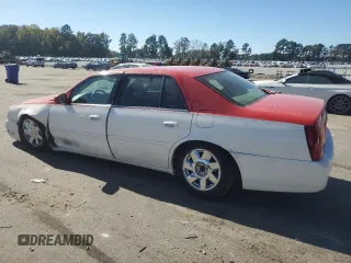 2002 Cadillac DeVille DTS with VIN 1G6KF57942U231877, listed as a Copart auction lot 76724554 with 180,082 mi miles and Salvage Title. Bid and sale history available at carsss.com. Image 2.