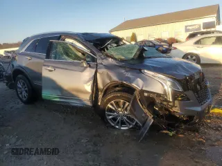 2021 Cadillac XT5 FWD Premium Luxury with VIN 1GYKNCRS7MZ191881, listed as a Copart auction lot 82167724 with 36,035 mi miles and Non Repairable. Bid and sale history available at carsss.com. Image 4.