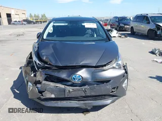 2016 Toyota Prius Four z VIN JTDKARFUXG3019426, wystawiony jako IAAI lot #42385785 z przebiegiem 94 838 mil mil oraz . Historia ofert i sprzedaży dostępna na DreamBid. Obrazek 12.