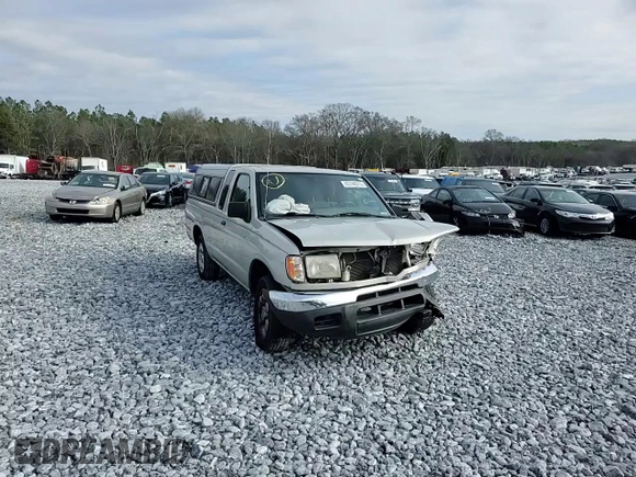 1999 Nissan Frontier XE with VIN 1N6DD26SXXC344449, listed as a Copart auction lot 43748015 with 137,318 mi miles and Salvage title. Bid and sale history available at DreamBid. Image 10.