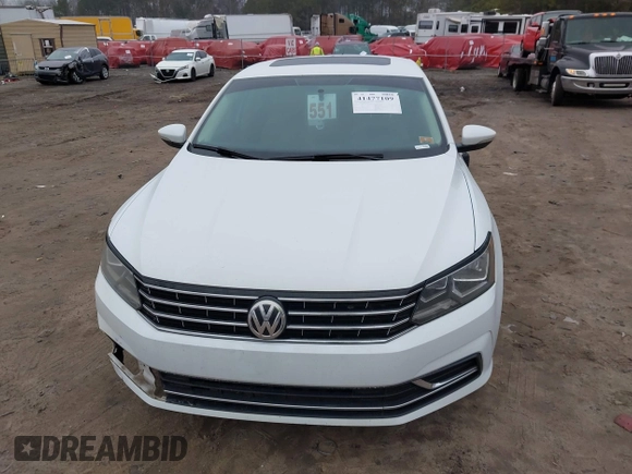 2016 Volkswagen Passat SE z VIN 1VWBS7A30GC013454, wystawiony jako IAAI lot #41477109 z przebiegiem 134 027 mil mil oraz . Historia ofert i sprzedaży dostępna na DreamBid. Obrazek 13.