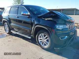 2018 Jeep Grand Cherokee Laredo E with VIN 1C4RJEAG4JC142123, listed as a IAAI auction lot 41025050 with 130,767 mi miles and . Bid and sale history available at DreamBid. Image 1.