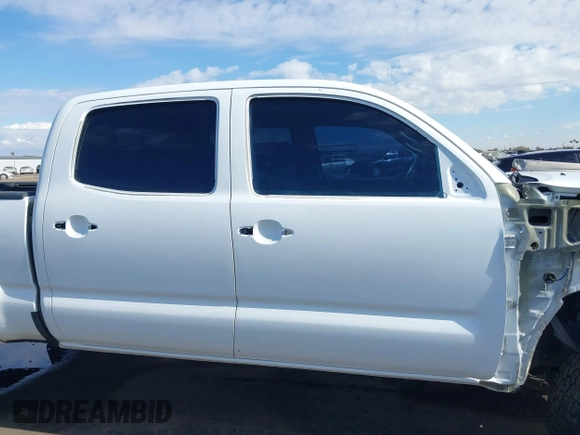 2014 Toyota Tacoma with VIN 3TMMU4FN9EM062808, listed as a IAAI auction lot 41450058 with 192,628 mi miles and . Bid and sale history available at DreamBid. Image 14.