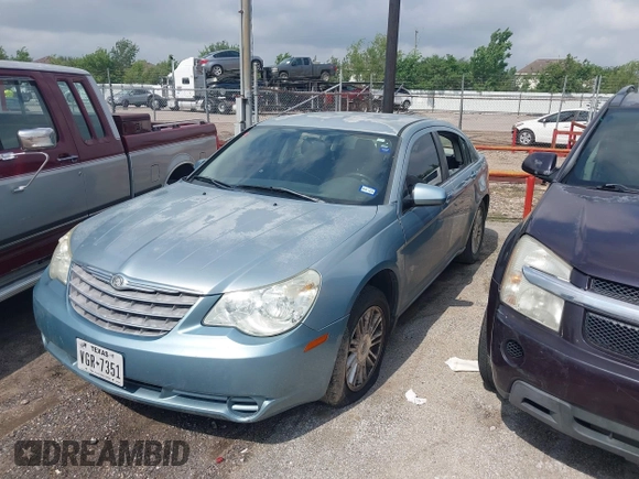 2009 Chrysler Sebring Touring *Ltd Avail* with VIN 1C3LC56D29N544726, listed as a IAAI auction lot 42036844 with 201,351 mi miles. Bid and sale history available at carsss.com. Image 2.