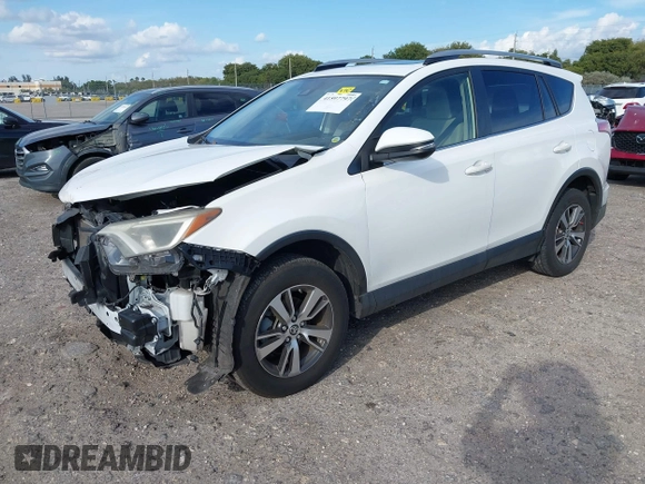 2018 Toyota RAV4 XLE with VIN JTMWFREV7JJ174483, listed as a IAAI auction lot 41597797 with 82,836 mi miles. Bid and sale history available at carsss.com. Image 18.