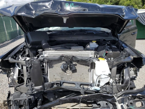 2023 Ram 1500 Big Horn with VIN 1C6SRFBT6PN514870, listed as a Copart auction lot 66008964 with 22,253 mi miles and Salvage Title. Bid and sale history available at carsss.com. Image 11.