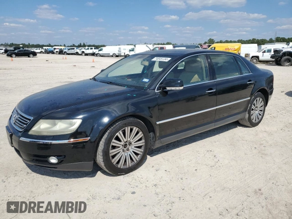 2005 Volkswagen Phaeton z VIN WVWAF03D658003589, wystawiony jako Copart lot #74049134 z przebiegiem 124 506 mil mil oraz Tytuł czysty. Historia ofert i sprzedaży dostępna na DreamBid. Obrazek 1.