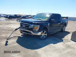 2022 Ford F-150 XL with VIN 1FTFW1E82NKD87353, listed as a IAAI auction lot 41769006 with 69,913 mi miles. Bid and sale history available at carsss.com. Image 2.