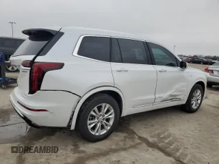 2024 Cadillac XT6 FWD Luxury with VIN 1GYKPAR47RZ720446, listed as a Copart auction lot 43964105 with 10,728 mi miles and Salvage Title. Bid and sale history available at carsss.com. Image 3.