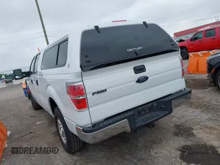 2014 Ford F-150 XL with VIN 1FTFW1ET8EFB33627, listed as a IAAI auction lot 42170252 with 173,886 mi miles. Bid and sale history available at carsss.com. Image 3.
