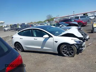 2023 Tesla Model 3 z VIN 5YJ3E1EA5PF553275, wystawiony jako IAAI lot #42132154 z przebiegiem Nie podano mil oraz . Historia ofert i sprzedaży dostępna na DreamBid. Obrazek 13.