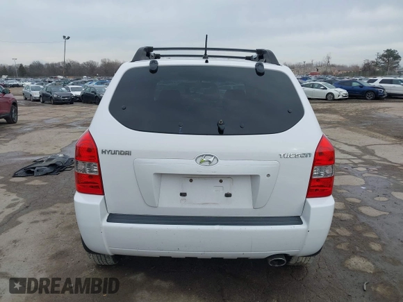 2006 Hyundai Tucson GL with VIN KM8JM12BX6U467288, listed as a IAAI auction lot 41679827 with 146,973 mi miles. Bid and sale history available at carsss.com. Image 17.