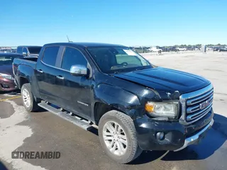 2016 GMC Canyon 2WD SLT with VIN 1GTG5DE35G1184141, listed as a IAAI auction lot 40875490 with 126,747 mi miles. Bid and sale history available at carsss.com. Image 1.