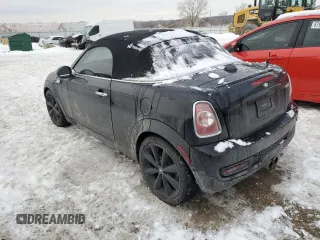 2013 MINI Roadster S z VIN WMWSY3C58DT566208, wystawiony jako Copart lot #41480595 z przebiegiem 119 265 mil mil oraz Szkody całkowita. Historia ofert i sprzedaży dostępna na DreamBid. Obrazek 2.
