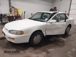 1995 Toyota Camry LE z VIN JT2SK12E8S0299203, wystawiony jako IAAI lot #39607993 z przebiegiem 193 374 mil mil oraz . Historia ofert i sprzedaży dostępna na DreamBid. Obrazek 2.