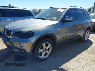 2008 BMW X5 3.0si with VIN 5UXFE43598L022453, listed as a IAAI auction lot 41852297 with 185,528 mi miles. Bid and sale history available at carsss.com. Image 2.
