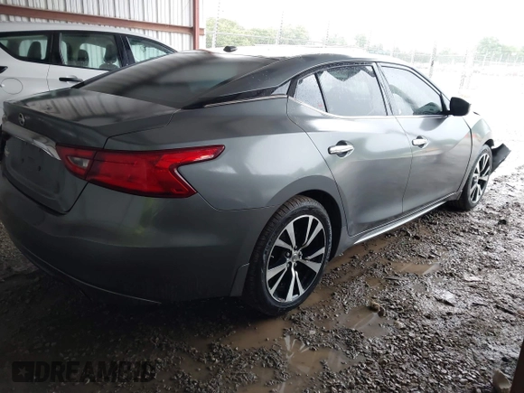 2018 Nissan Maxima Platinum z VIN 1N4AA6AP4JC390235, wystawiony jako IAAI lot #42376364 z przebiegiem 152 293 mil mil oraz . Historia ofert i sprzedaży dostępna na DreamBid. Obrazek 4.