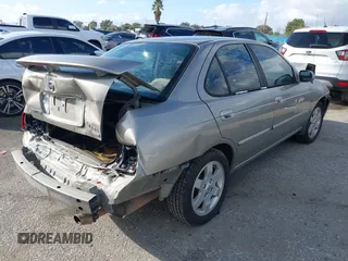 2006 Nissan Sentra S z VIN 3N1CB51D56L514396, wystawiony jako IAAI lot #41591034 z przebiegiem 350 322 mil mil oraz . Historia ofert i sprzedaży dostępna na DreamBid. Obrazek 4.