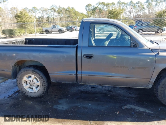 2001 Dodge Dakota with VIN 1B7FL26X91S342103, listed as a IAAI auction lot 41277465 with 157,993 mi miles. Bid and sale history available at carsss.com. Image 13.