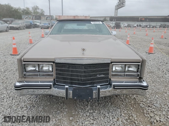 1985 Cadillac Eldorado z VIN 1G6EL5788FE655155, wystawiony jako Copart lot #73223134 z przebiegiem 68 676 mil mil oraz Tytuł czysty. Historia ofert i sprzedaży dostępna na DreamBid. Obrazek 5.