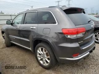 2014 Jeep Grand Cherokee Summit с VIN 1C4RJFJG6EC500348, выставлен на аукционе Copart как лот 59166275 с пробегом 104 623 миль миль и Списание • Salvage title. История ставок и продаж доступна на DreamBid. Изображение 2.