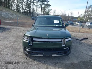 2022 Rivian R1T Adventure z VIN 7FCTGAAA8NN015369, wystawiony jako IAAI lot #41407842 z przebiegiem 22 507 mil mil oraz . Historia ofert i sprzedaży dostępna na DreamBid. Obrazek 12.
