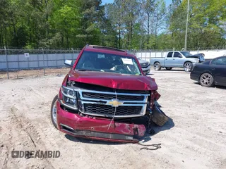 2019 Chevrolet Tahoe LT z VIN 1GNSKBKC2KR338107, wystawiony jako IAAI lot #41999167 z przebiegiem 117 260 mil mil oraz . Historia ofert i sprzedaży dostępna na DreamBid. Obrazek 12.