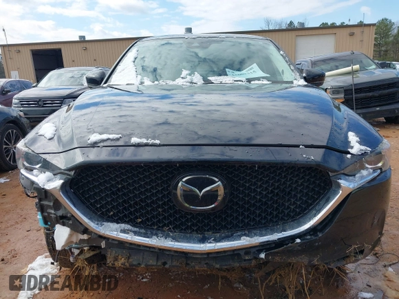 2020 Mazda CX-5 Touring z VIN JM3KFBCMXL1741182, wystawiony jako IAAI lot #41602315 z przebiegiem 31 582 mil mil oraz . Historia ofert i sprzedaży dostępna na DreamBid. Obrazek 13.
