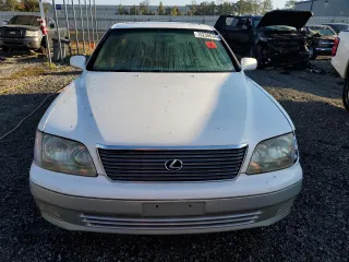 2000 Lexus LS 400 z VIN JT8BH28F0Y0175297, wystawiony jako Copart lot #75230834 z przebiegiem 293 851 mil mil oraz Szkoda całkowita • Salvage title. Historia ofert i sprzedaży dostępna na DreamBid. Obrazek 5.