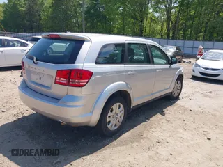 2014 Dodge Journey American Value with VIN 3C4PDCAB5ET112789, listed as a IAAI auction lot 42072546 with 149,094 mi miles and . Bid and sale history available at DreamBid. Image 4.
