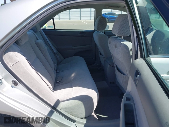 2004 Toyota Camry LE with VIN 4T1BE32K74U300025, listed as a IAAI auction lot 42035954 with 115,203 mi miles. Bid and sale history available at carsss.com. Image 8.