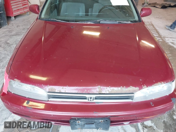 1992 Honda Accord z VIN 1HGCB7252NA025400, wystawiony jako IAAI lot #42438708 z przebiegiem 306 637 mil mil oraz . Historia ofert i sprzedaży dostępna na DreamBid. Obrazek 6.