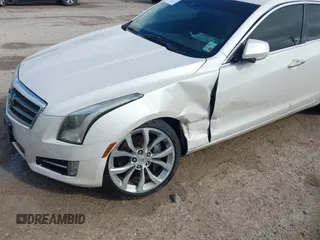 2013 Cadillac ATS Performance z VIN 1G6AC5S36D0111225, wystawiony jako IAAI lot #41511694 z przebiegiem 153 250 mil mil oraz . Historia ofert i sprzedaży dostępna na DreamBid. Obrazek 6.