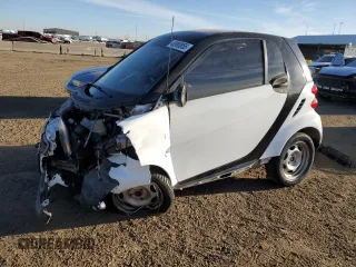 2013 Smart fortwo Pure with VIN WMEEJ3BA8DK698590, listed as a Copart auction lot 48980855 with 68,918 mi miles and Salvage Title. Bid and sale history available at carsss.com. Image 1.