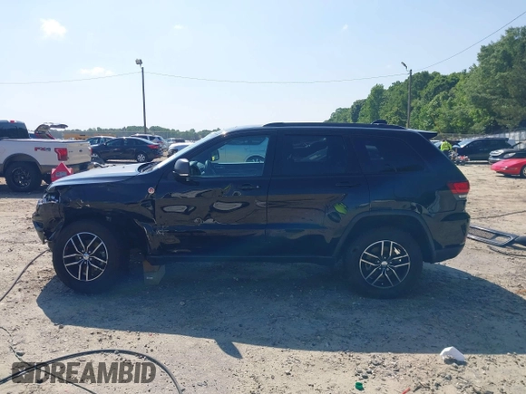 2017 Jeep Grand Cherokee Trailhawk with VIN 1C4RJFLG4HC940652, listed as a IAAI auction lot 42135489 with 102,593 mi miles and . Bid and sale history available at DreamBid. Image 15.
