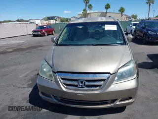 2007 Honda Odyssey EX z VIN 5FNRL38407B123509, wystawiony jako IAAI lot #42238353 z przebiegiem 200 111 mil mil oraz . Historia ofert i sprzedaży dostępna na DreamBid. Obrazek 6.