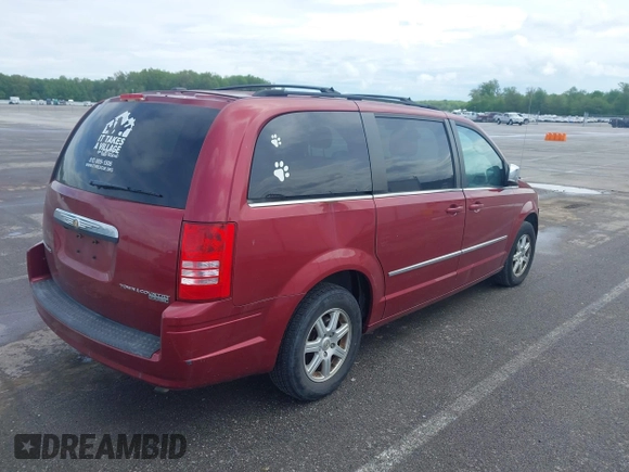 2010 Chrysler Town & Country Touring Plus with VIN 2A4RR8D13AR423431, listed as a IAAI auction lot 42156947 with 192,433 mi miles. Bid and sale history available at carsss.com. Image 4.