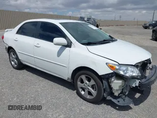 2011 Toyota Corolla L with VIN 2T1BU4EE8BC714122, listed as a IAAI auction lot 42073121 with 221,176 mi miles. Bid and sale history available at carsss.com. Image 1.