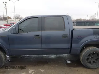 2004 Ford F-150 XLT with VIN 1FTPW14514KD30054, listed as a IAAI auction lot 41440735 with 202,340 mi miles. Bid and sale history available at carsss.com. Image 14.