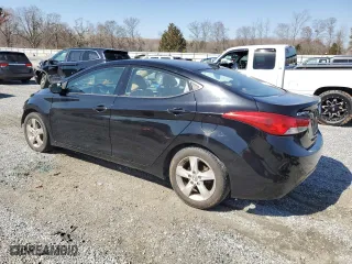 2013 Hyundai Elantra GLS PZEV with VIN KMHDH4AE1DU999945, listed as a Copart auction lot 48854195 with 211,992 mi miles and Salvage Title. Bid and sale history available at carsss.com. Image 2.