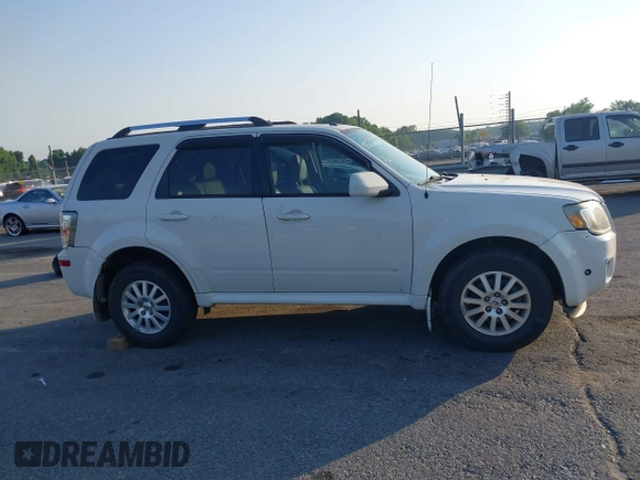 2011 Mercury Mariner Premier with VIN 4M2CN8HG0BKJ02401, listed as a IAAI auction lot 42579483 with 126,276 mi miles and . Bid and sale history available at DreamBid. Image 13.